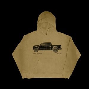 POST MALONE GARMENT DYED HOODIE FEATURING AUSTIN TRUCK GRAPHIC ON FRONT.